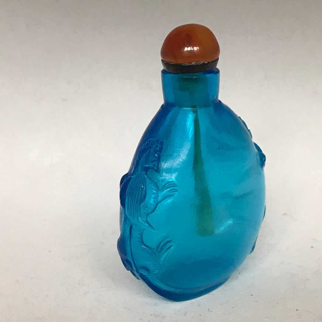 Snuff Bottle:  Clear Blue Glass Bottle with Mythical Creature